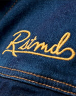 closeup on rstmd script on the thrill of speed denim jacket
