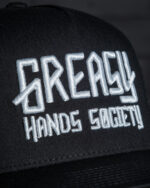 grasy hands society hat front detail